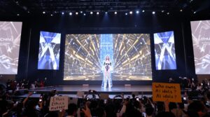 K-pop label debuts an AI-powered virtual idol, sparking fan excitement and ethical debate over the future of digital performers