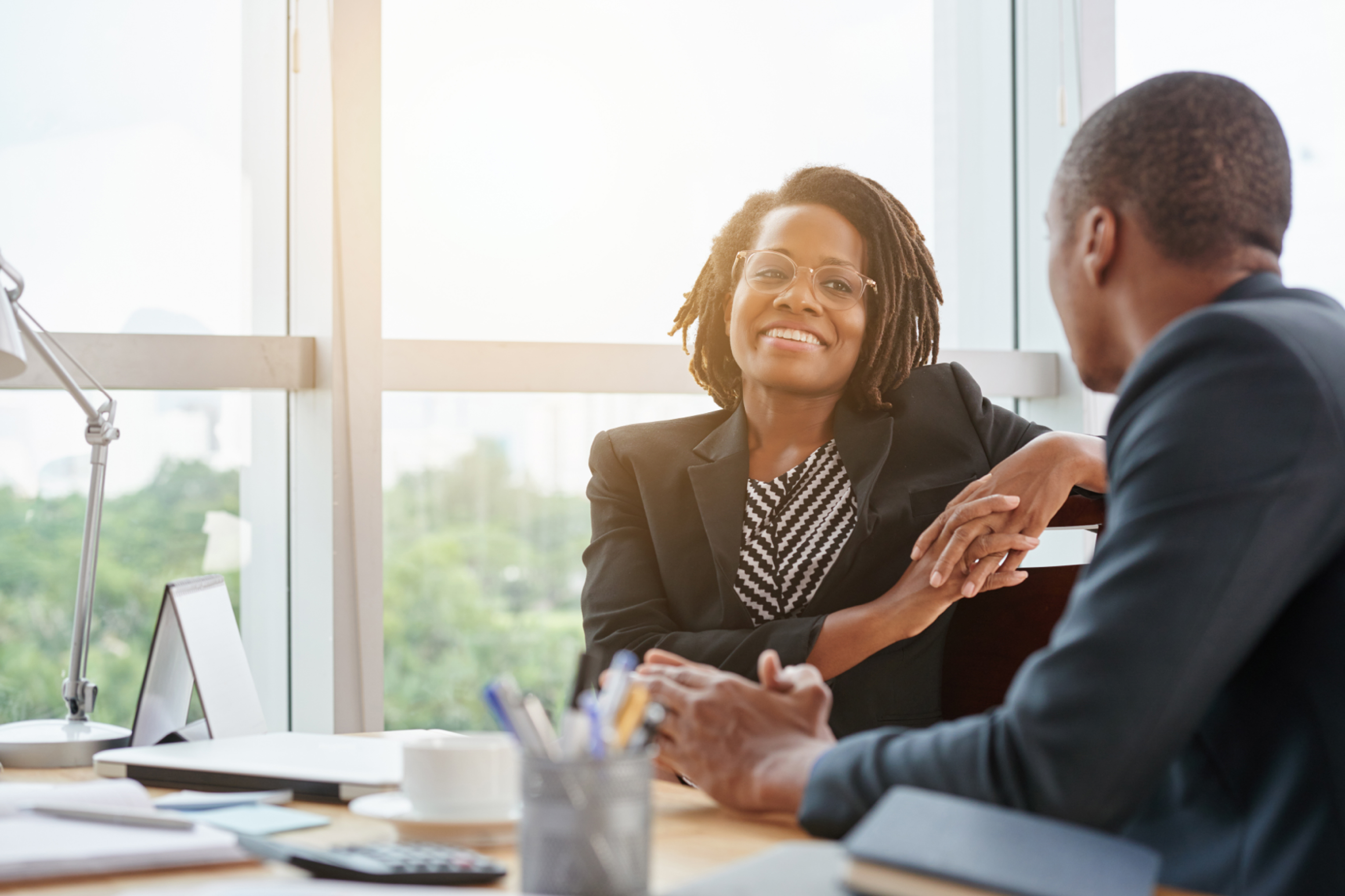 woman smiling with client